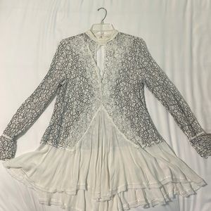 Free People Black and White Lace Dress with Long sleeves. Size Small.